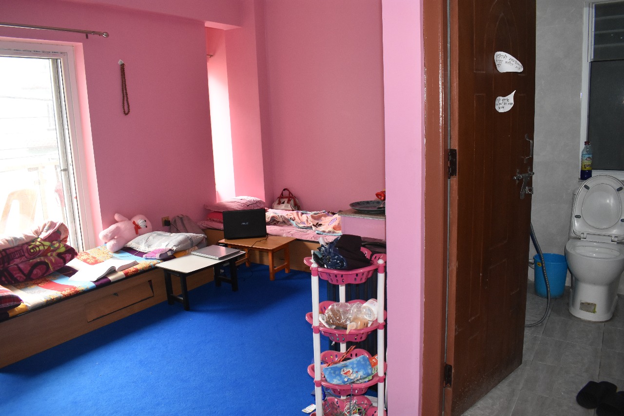 Cozy hostel living room with warm interiors